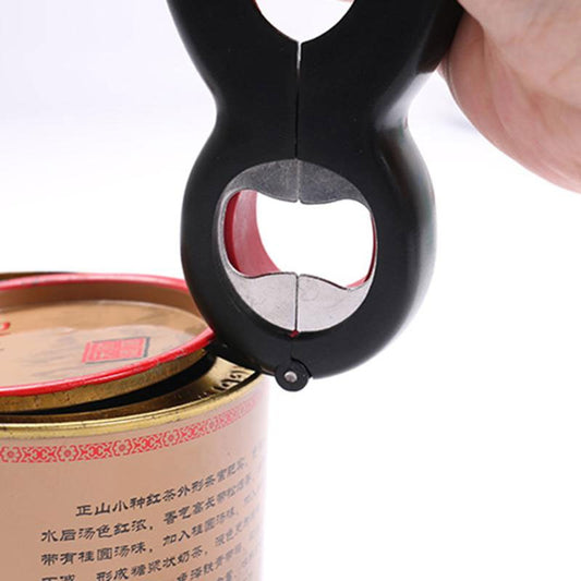 Opening a can lid with the 6-in-1 bottle & can opener”