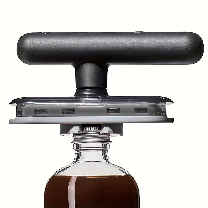 Side view of the adjustable manual can opener gripping a can