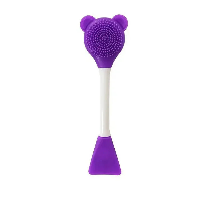 Double-head silicone mask applicator with brush and scoop ends purple